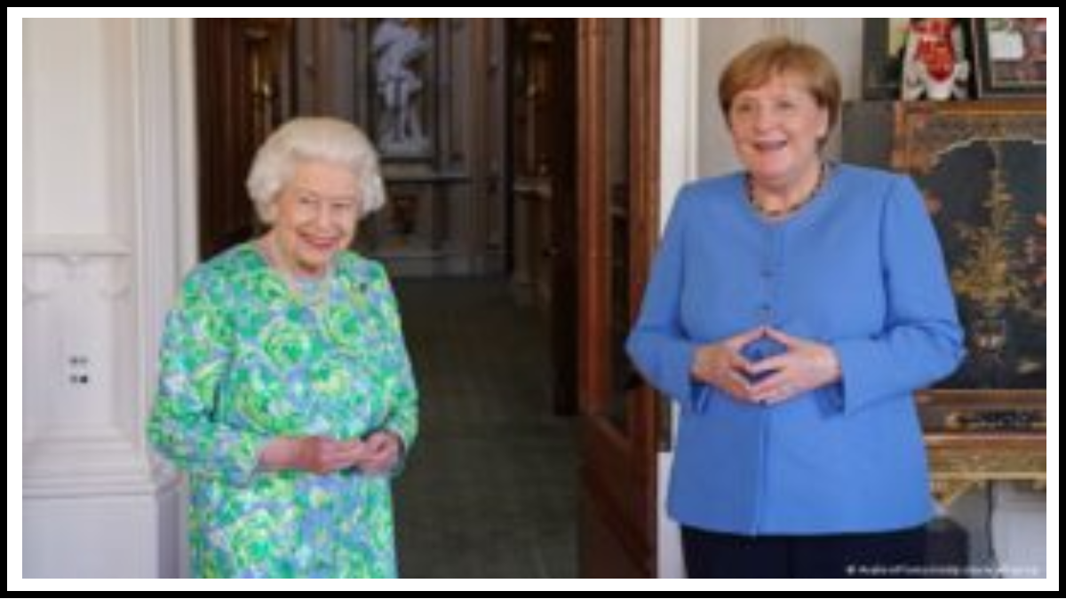 знак руки Меркель в виде треугольника